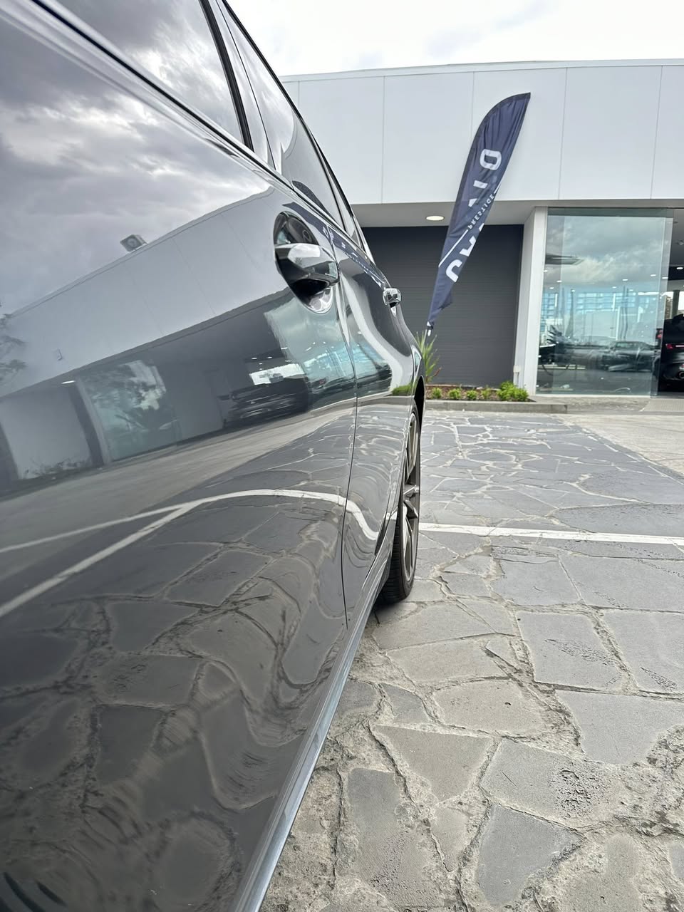 Prestige vehicle door after paintless dent removal — paint perfect